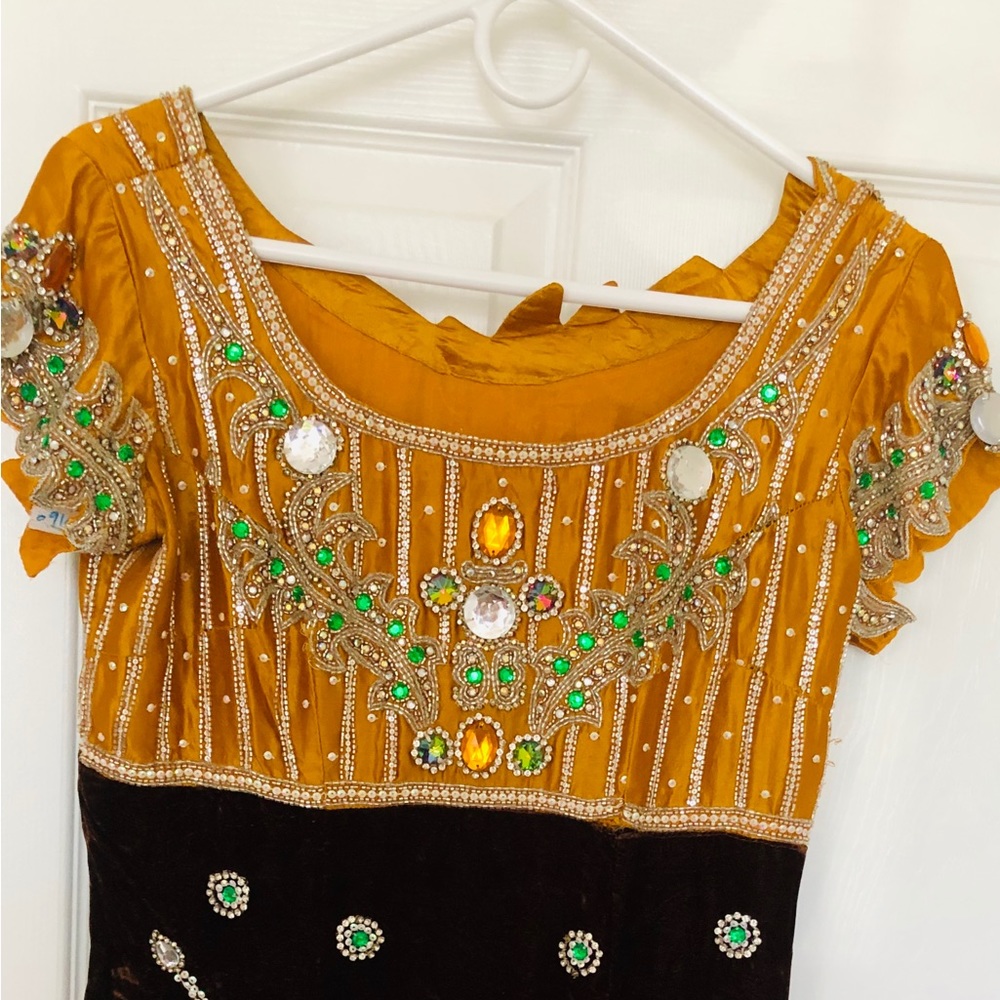 Beautiful velvet with full work Kurta and bottom .
